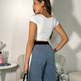 Pantalón deportivo vaquero a rayas negro