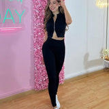 Conjunto Leggins Negro Blusa Cierre